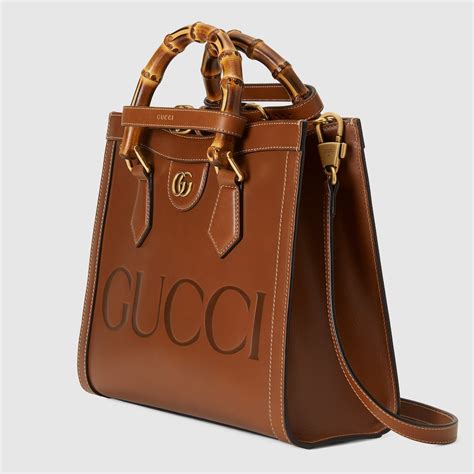 purse with the word gucci on thr front